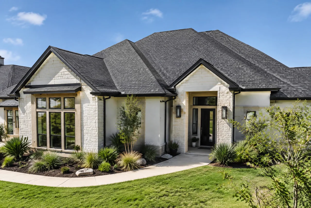 Illustrative South Texas home with a charcoal shingle roof